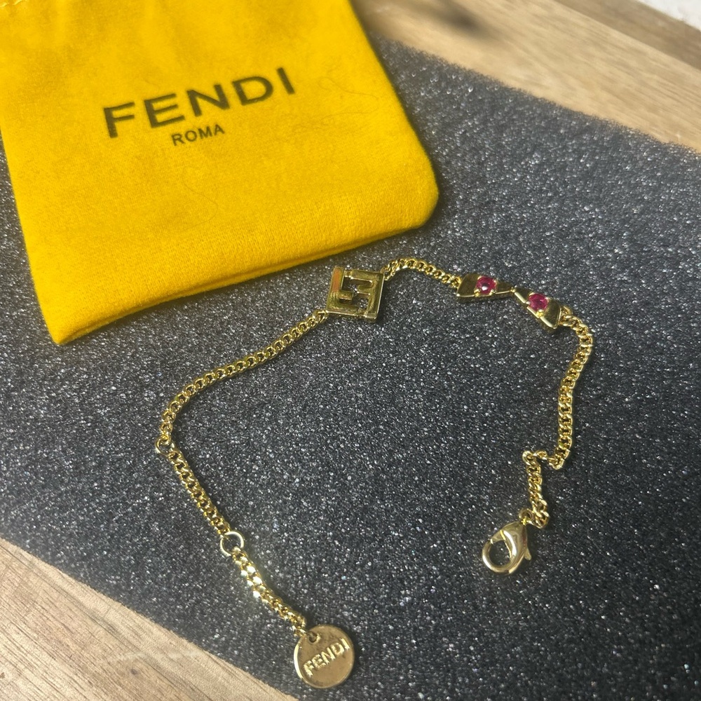 ******** SOLD********Fendi Gold and Pink Charm Bracelet